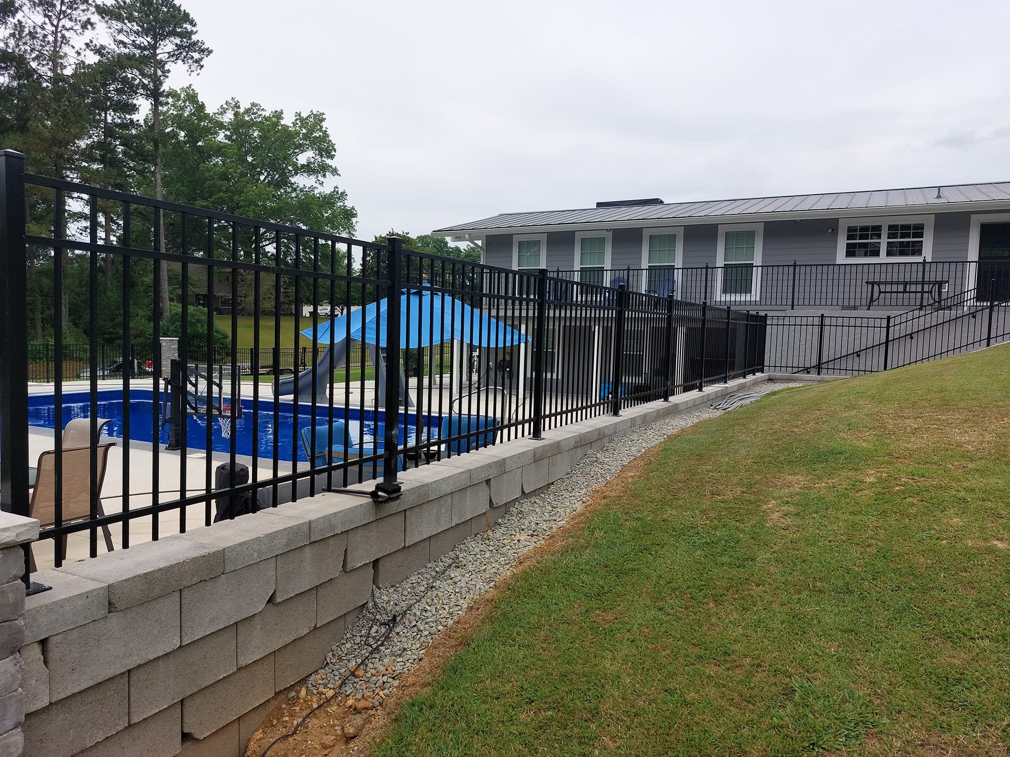 Wooden cross-buck ranch fence built by Precision Fence Company in Columbia, Tennessee