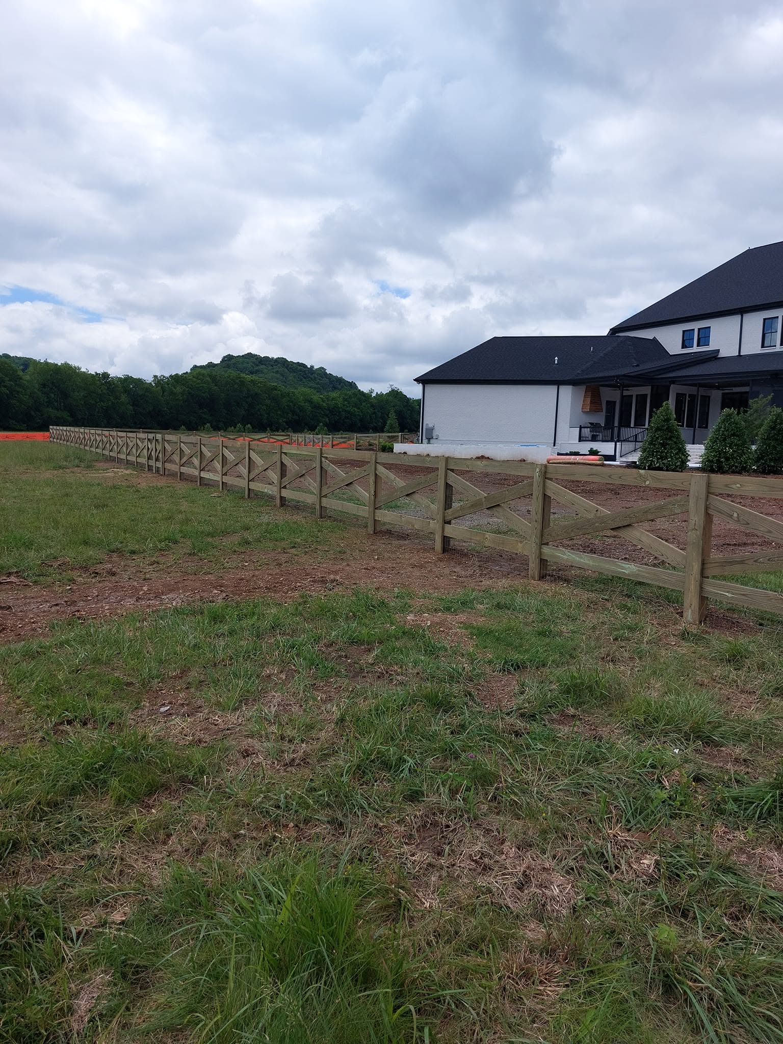 Wooden ranch fence built by Precision Fence Company in Columbia, Tennessee